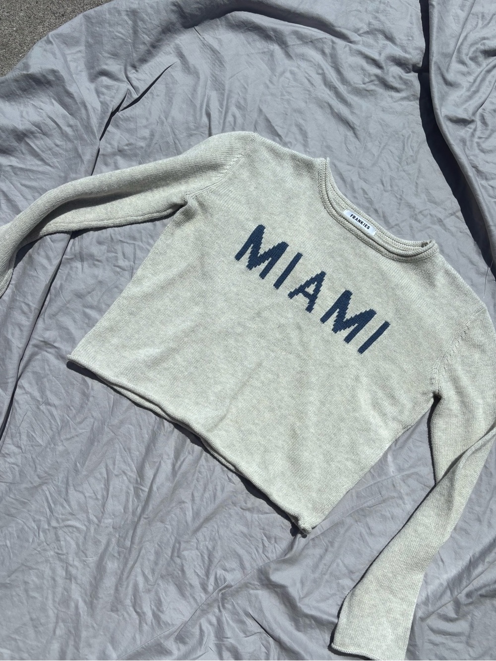 Frankie’s Bikinis Cropped “Miami” sweater